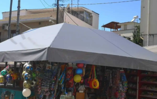 Τοποθέτηση τέντας σε περίπτερο