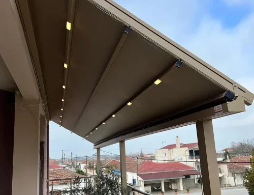 Awnings with Somfy motor arms and off-white fabric